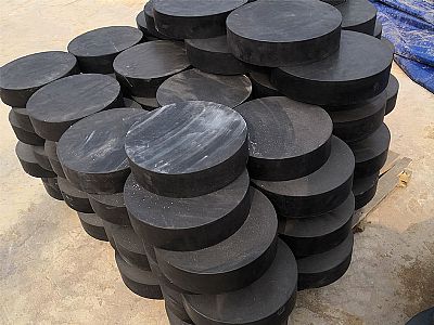 仲巴县板式橡胶支座由若干层橡胶片与薄钢板经加压硫化